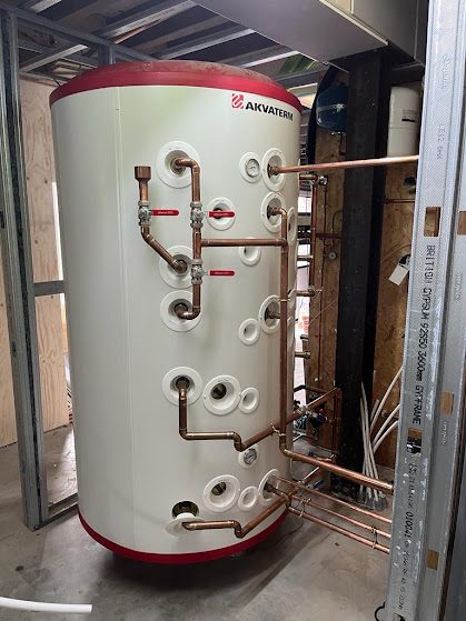 Large cylinder with neat copper pipework